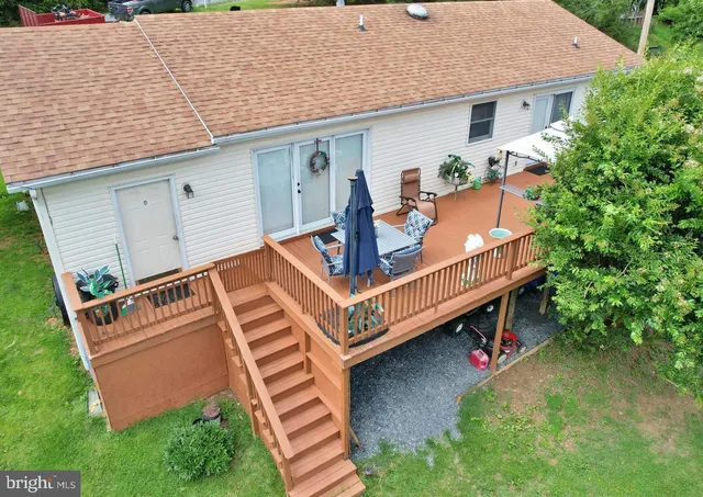 a view of backyard with deck