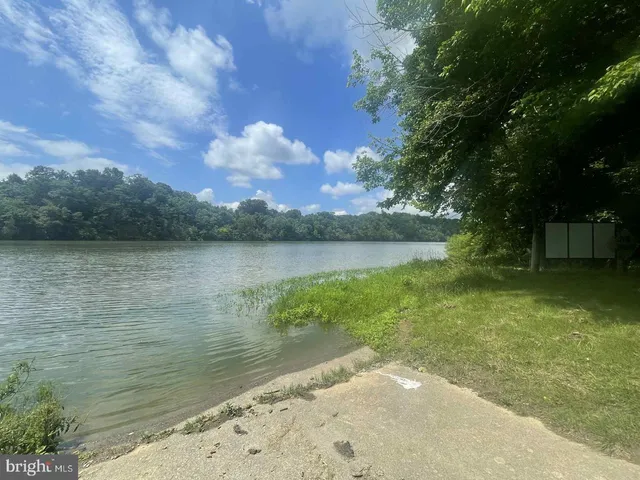 a view of a lake from a yard