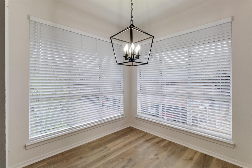 10530 Stone Canyon Road, Unit 208 Dallas, TX 75230 - Photo 19 of 24 a view of a livingroom with a window