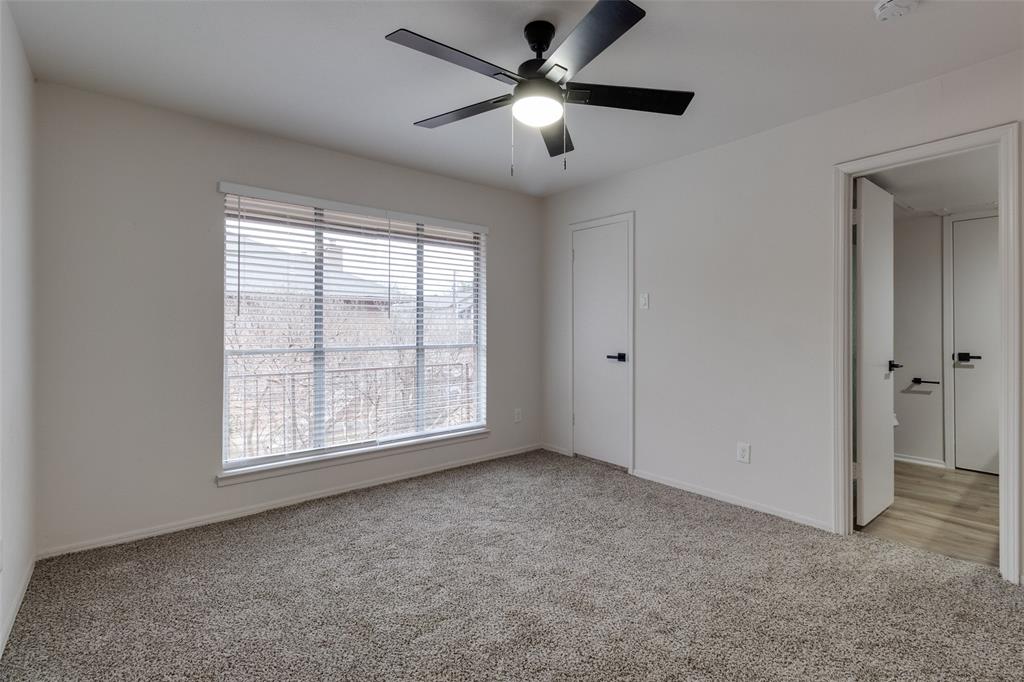 10530 Stone Canyon Road, Unit 208 Dallas, TX 75230 - Photo 20 of 24 a view of an empty room with a window
