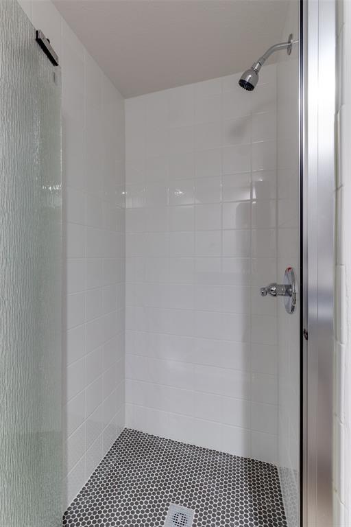 10530 Stone Canyon Road, Unit 208 Dallas, TX 75230 - Photo 21 of 24 a view of a bedroom