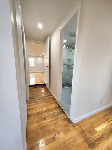 a view of a hallway to a room