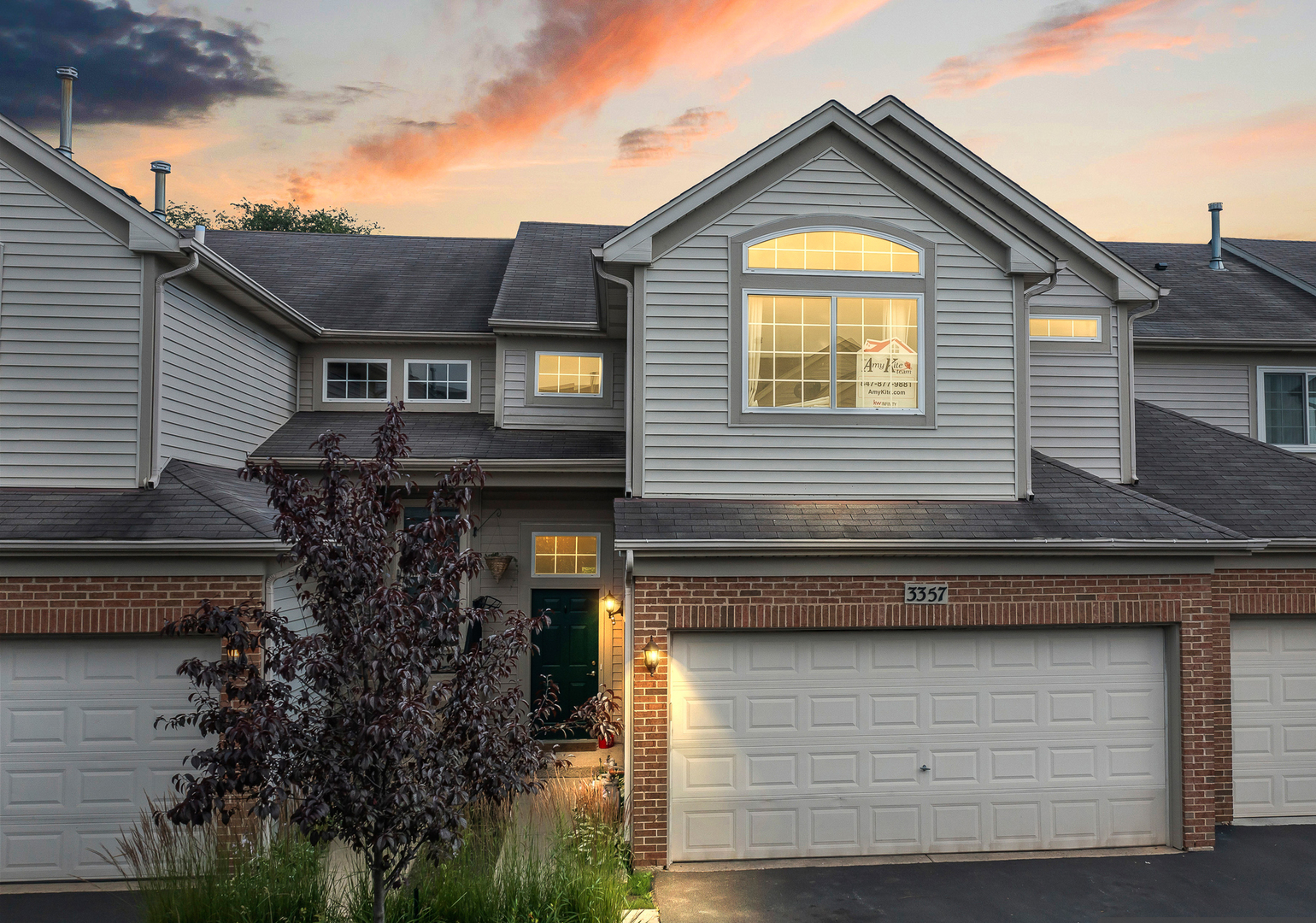 3357 Blue Ridge Drive Carpentersville, IL 60110 - Photo 1 of 1 a front view of a house with a garage