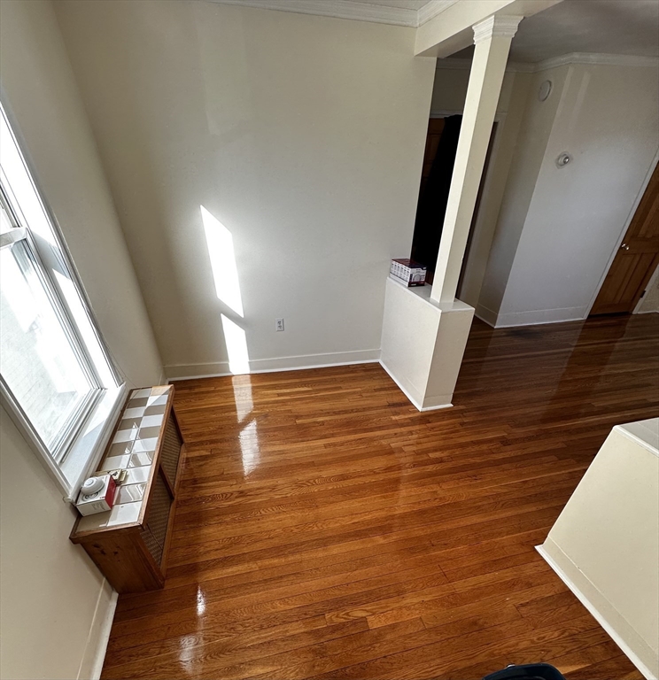45 Highland Avenue, Unit 2 Everett, MA 02149 - Photo 2 of 9 a view of an entryway with wooden floor