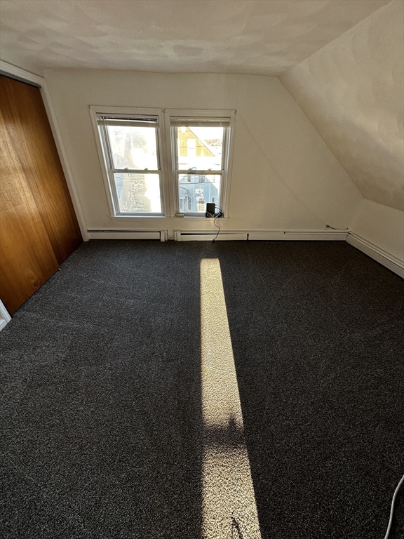45 Highland Avenue, Unit 2 Everett, MA 02149 - Photo 5 of 9 a view of an empty room and window