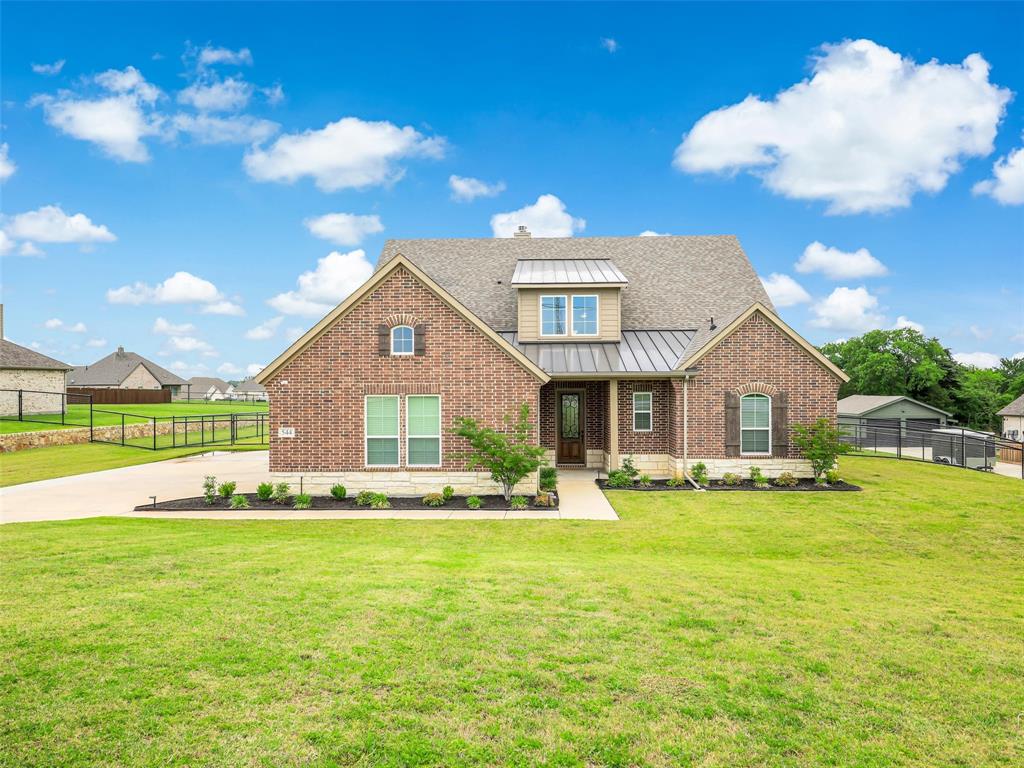 544 Majors Road Van Alstyne, TX 75495 - Photo 31 of 36 a front view of house with an outdoor space and seating