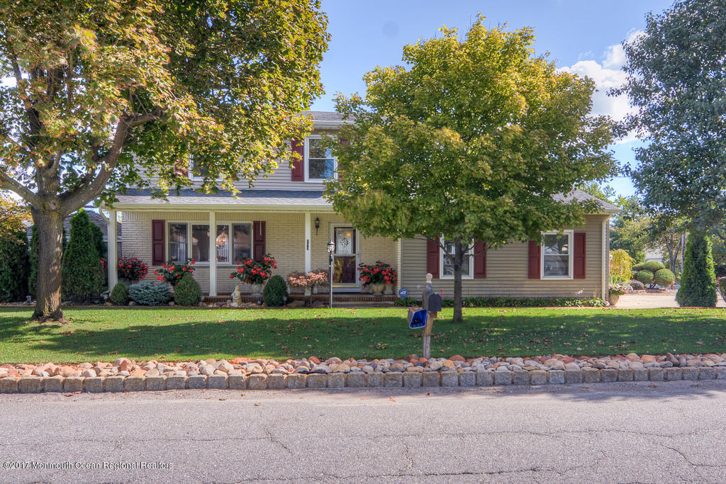 173 Club House Road Brick, NJ 08723 - Photo 1 of 30 a view of a house with a yard