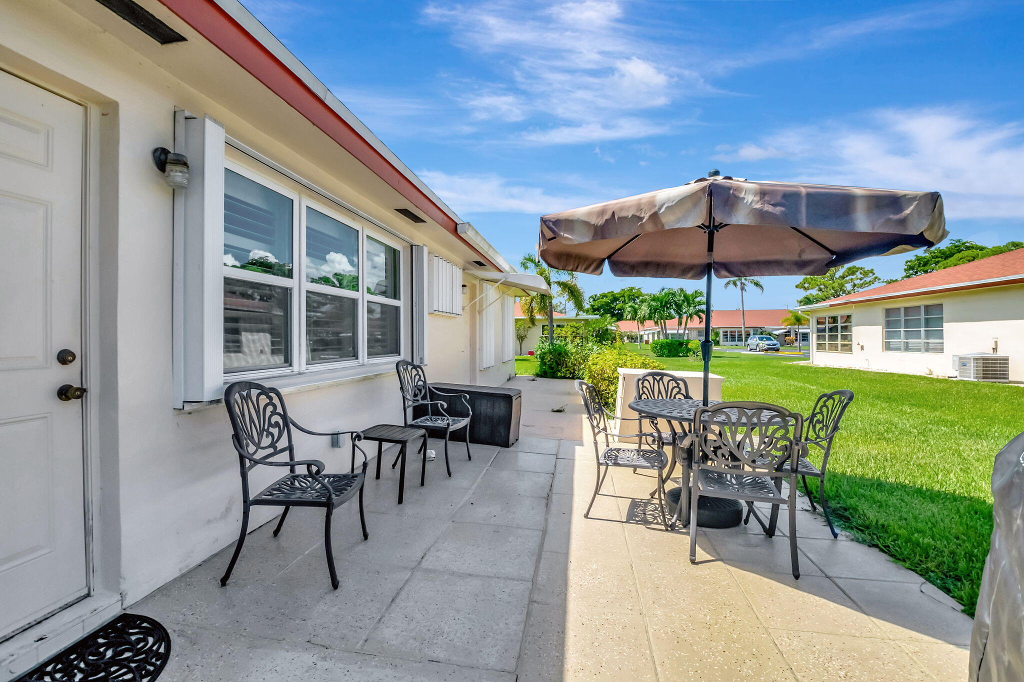 5145 Northwest 3rd Street, Unit B Delray Beach, FL 33445 - Photo 33 of 54 Backyard patio view (1)