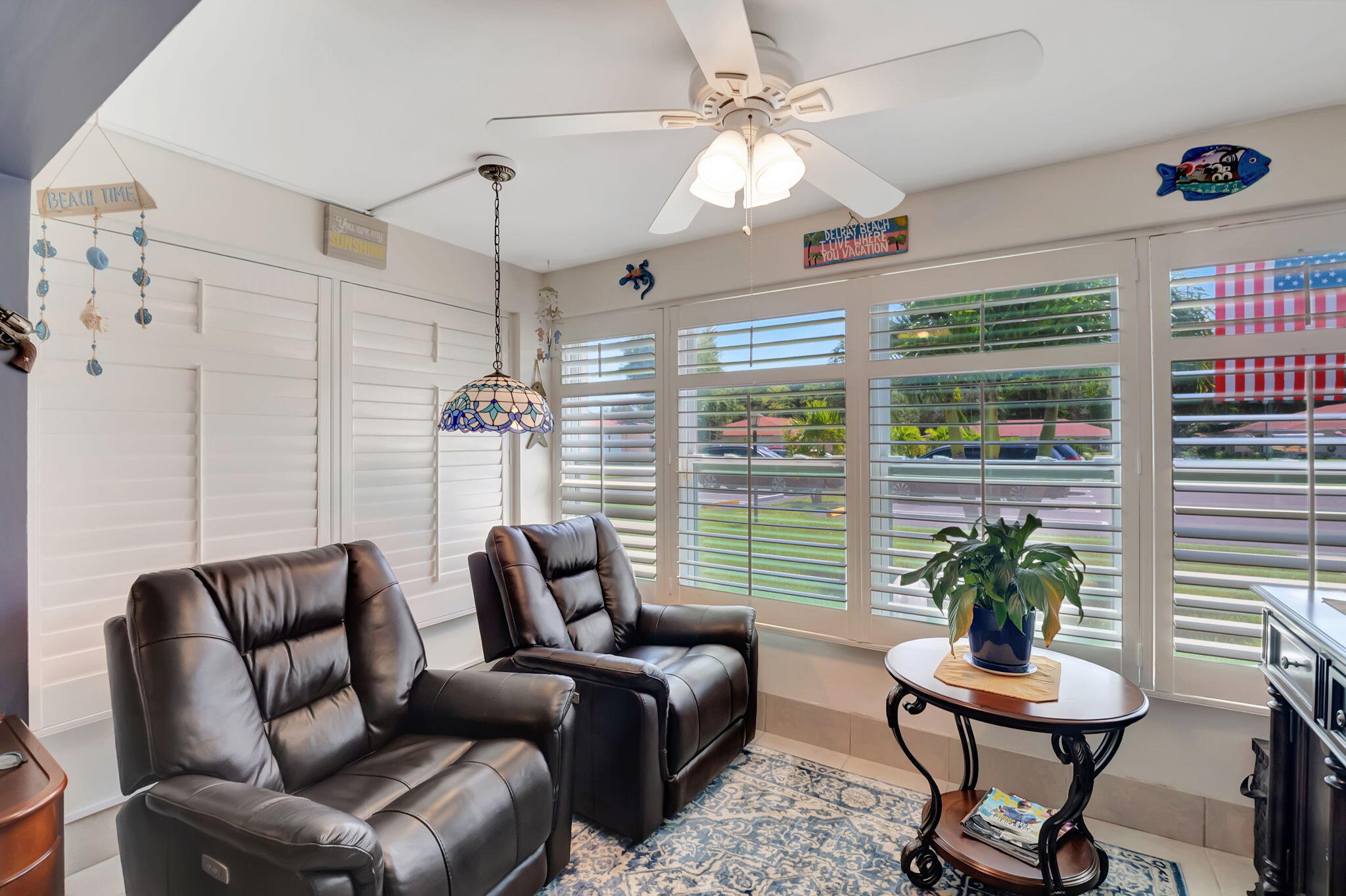 5145 Northwest 3rd Street, Unit B Delray Beach, FL 33445 - Photo 7 of 54 Enclosed Florida room under air (1)