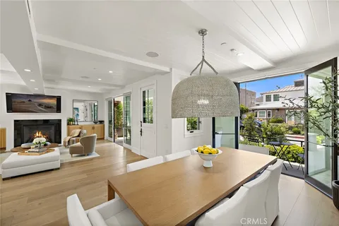 a view of a living room and dining room