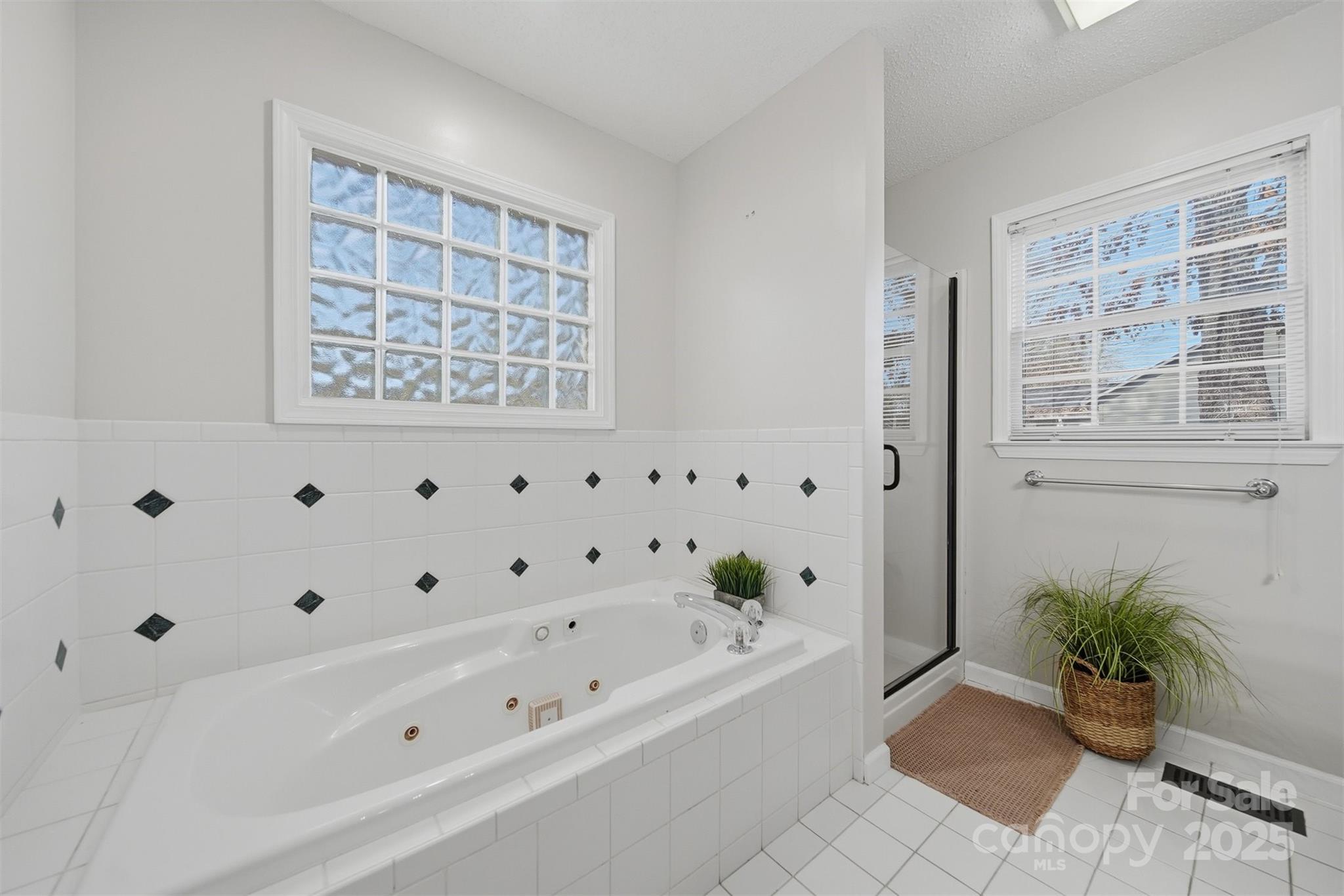 4687 Ransom Drive Conover, NC 28613 - Photo 17 of 27 a bathroom with a bathtub and shower