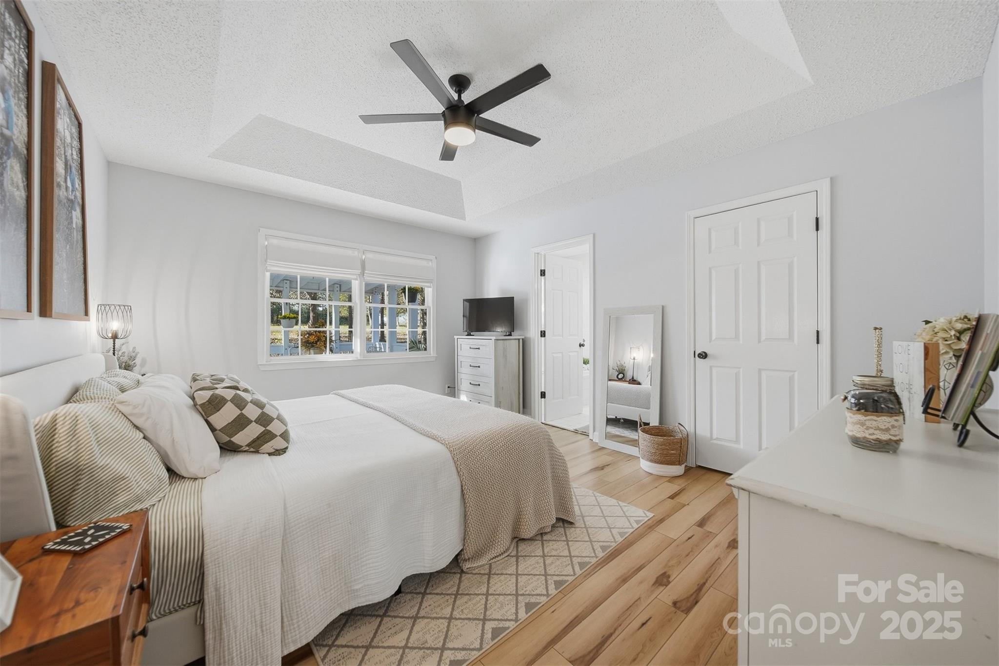 4687 Ransom Drive Conover, NC 28613 - Photo 6 of 27 a bedroom with a bed a window and a dresser