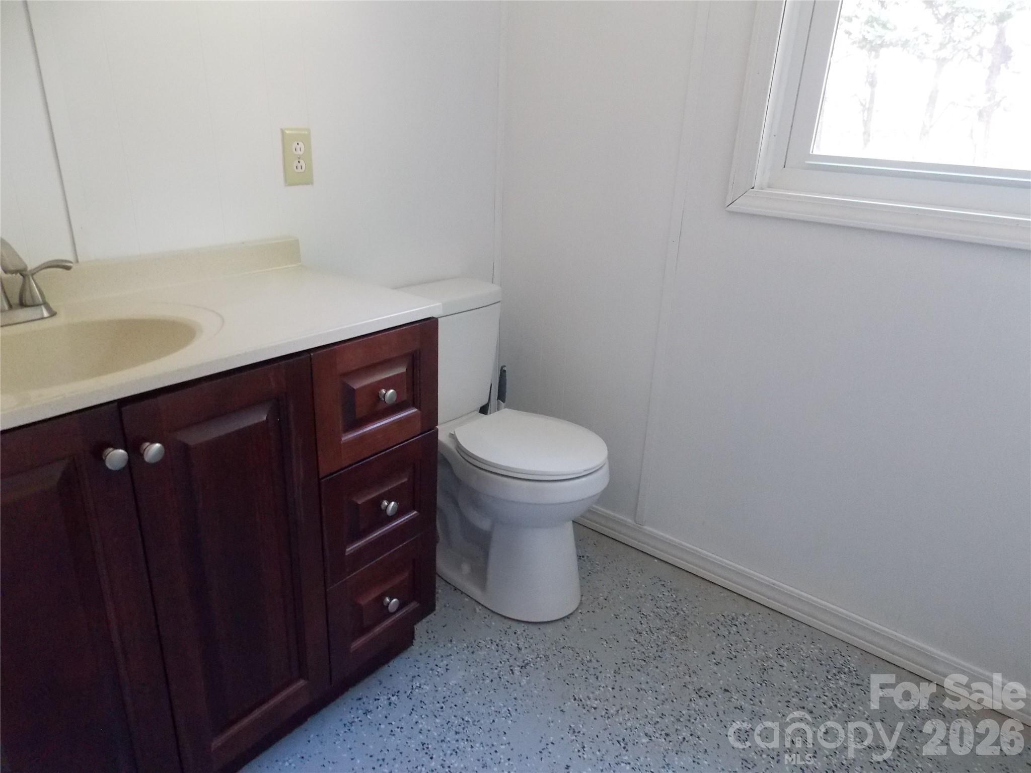 1380 May Road Granite Falls, NC 28630 - Photo 16 of 26 a bathroom with a sink and a toilet