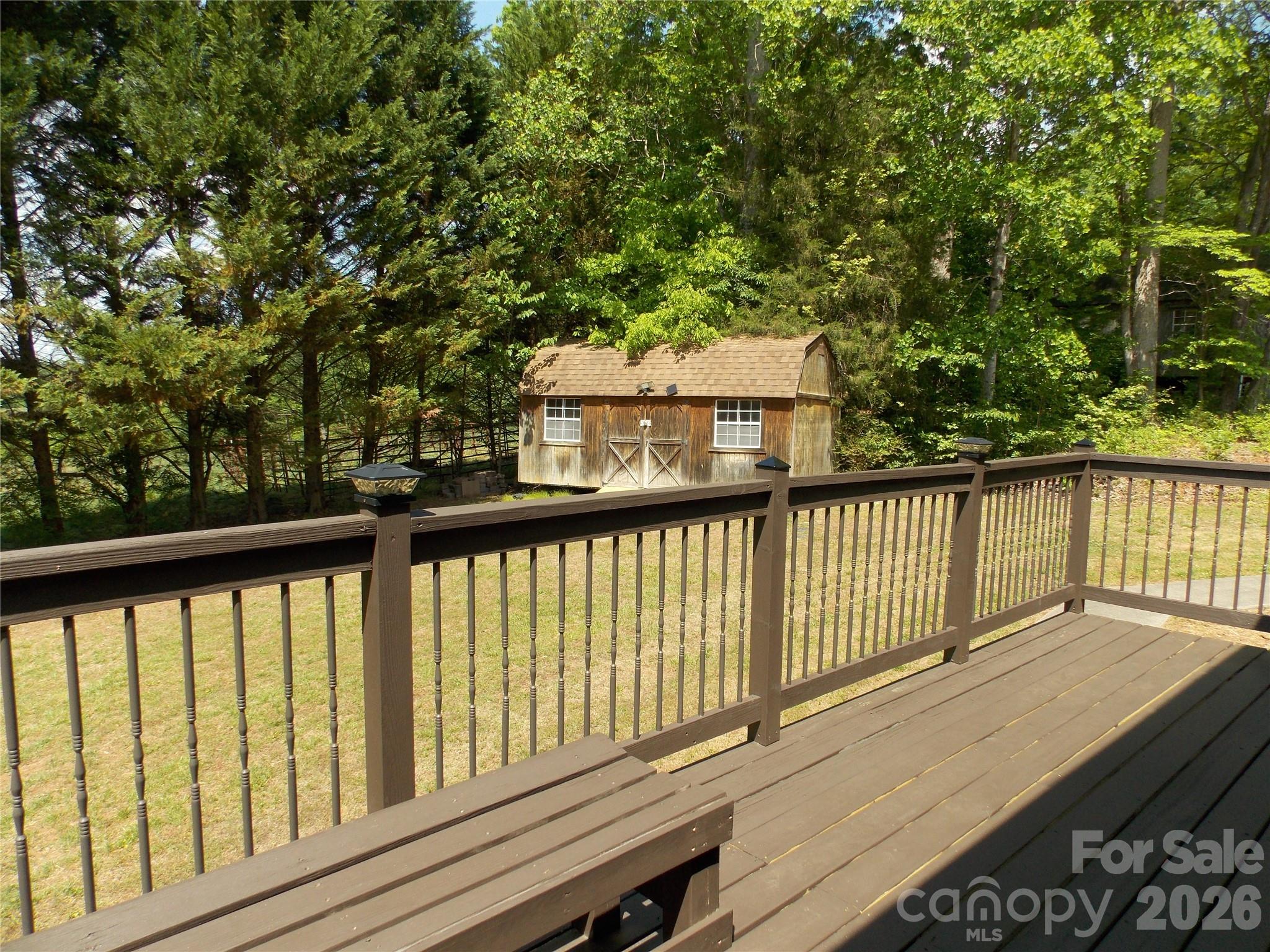 1380 May Road Granite Falls, NC 28630 - Photo 19 of 26 a balcony with wooden floor and fence