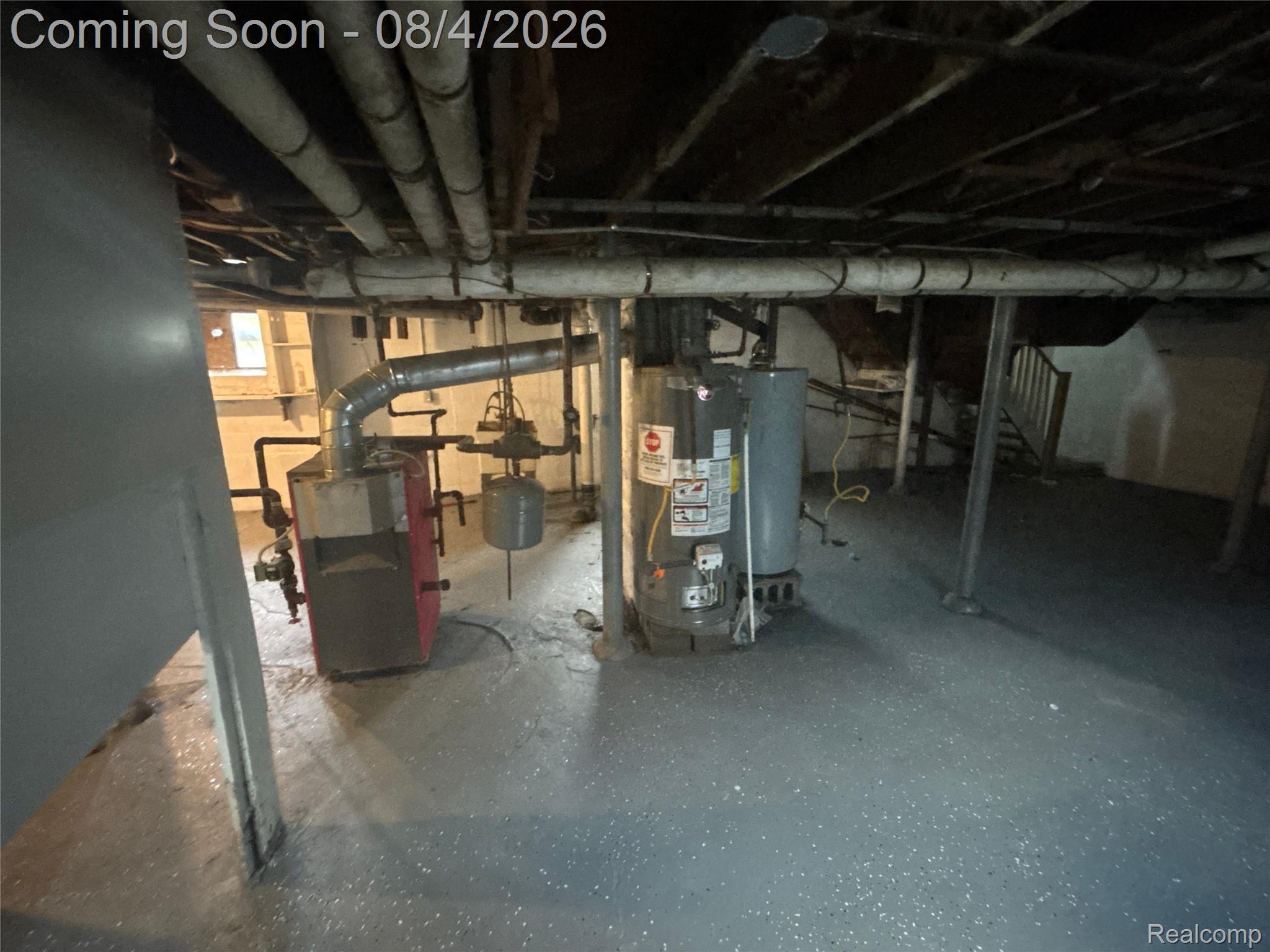 8210 Decatur Street Detroit, MI 48228 - Photo 19 of 24 Basement utility area featuring a water heater and boiler