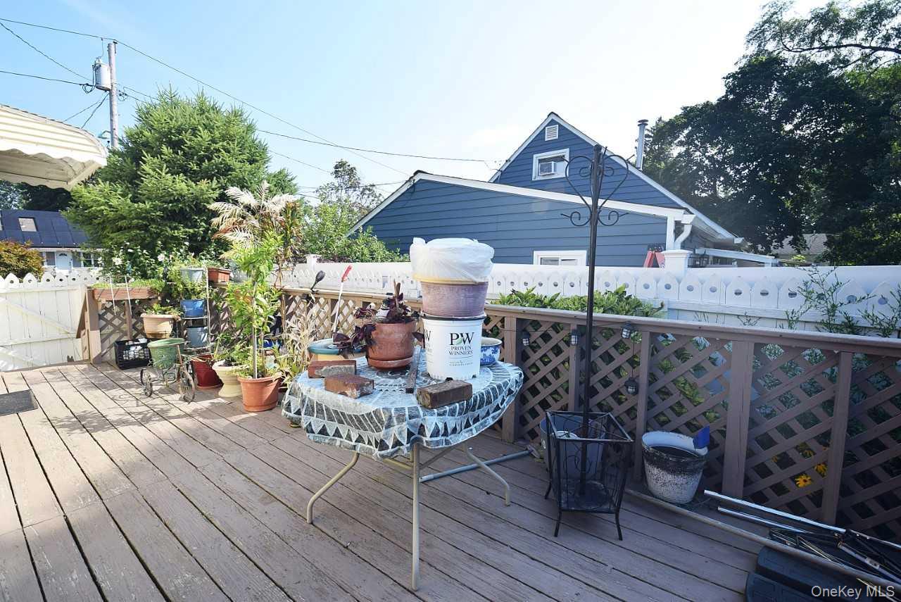 14 East Walnut Street Central Islip, NY 11722 - Photo 16 of 18 a front view of a house with sitting area