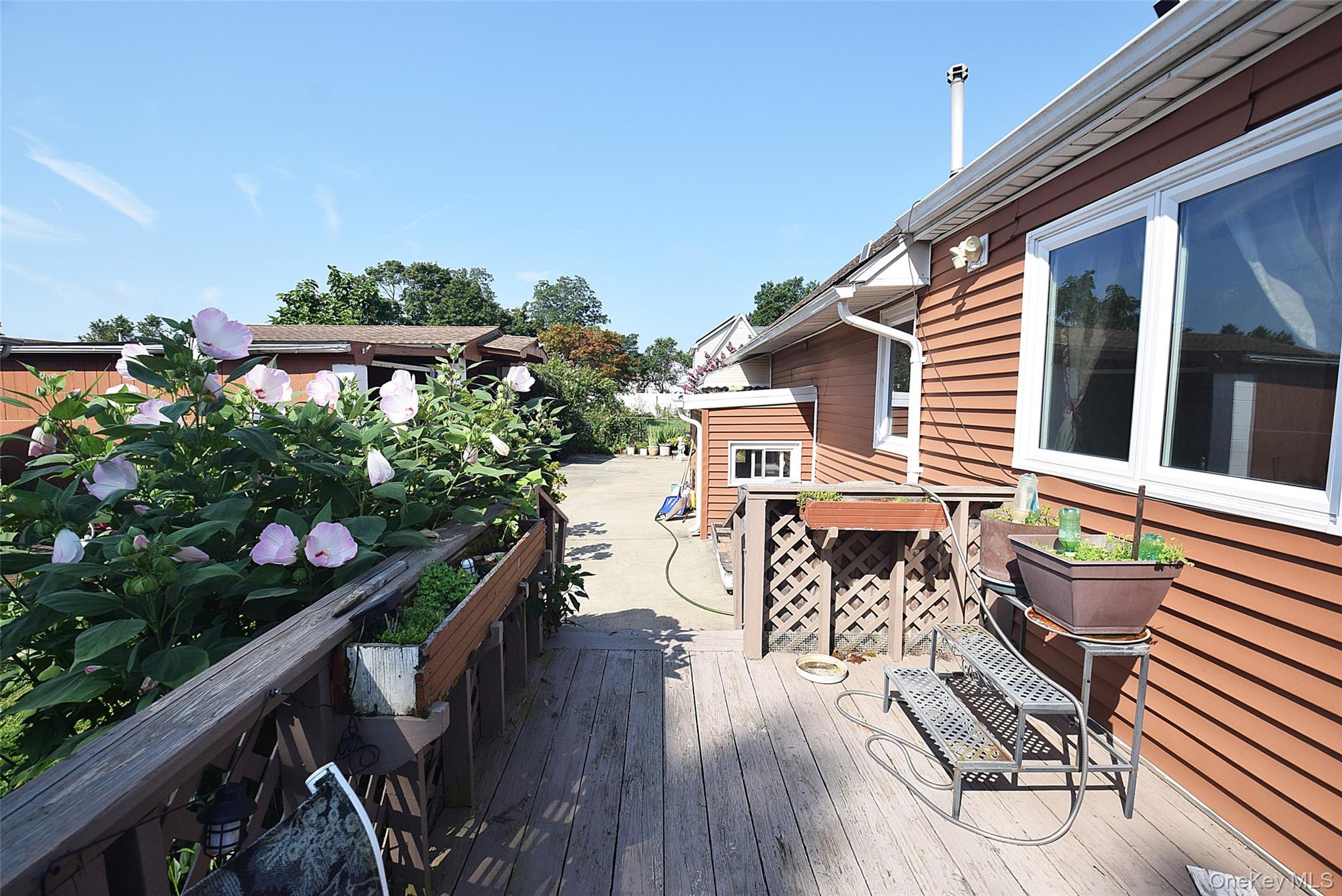 14 East Walnut Street Central Islip, NY 11722 - Photo 17 of 18 a view of deck with patio