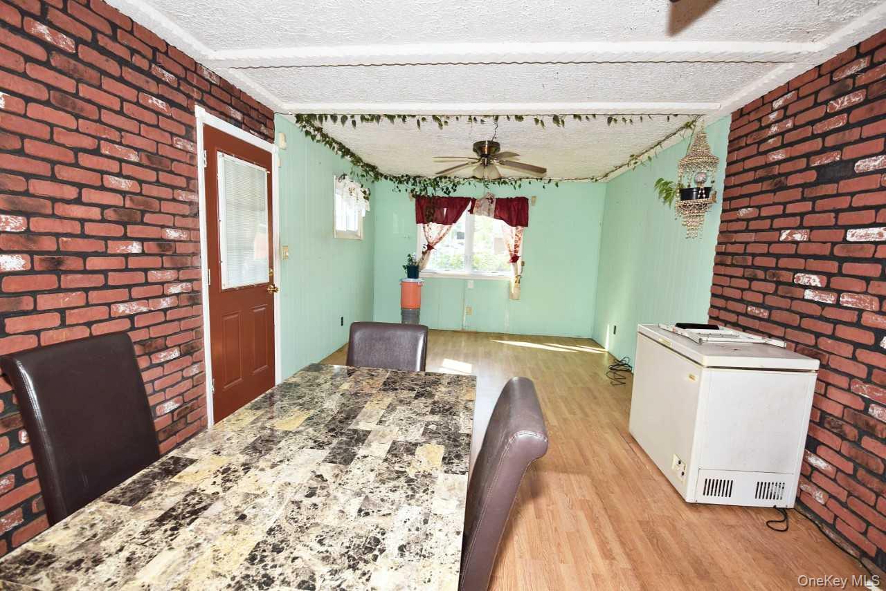 14 East Walnut Street Central Islip, NY 11722 - Photo 7 of 18 a bed room with a bed