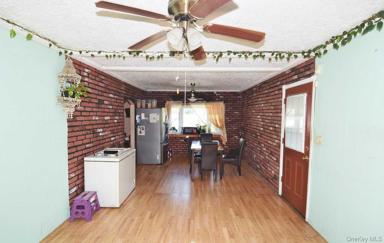 14 East Walnut Street Central Islip, NY 11722 - Photo 9 of 18 a very nice looking room with a large window