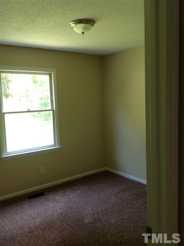7113 Tyndall Court Raleigh, NC 27615 - Photo 9 of 13 2nd bedroom to accommodate a small family or could be a great office area