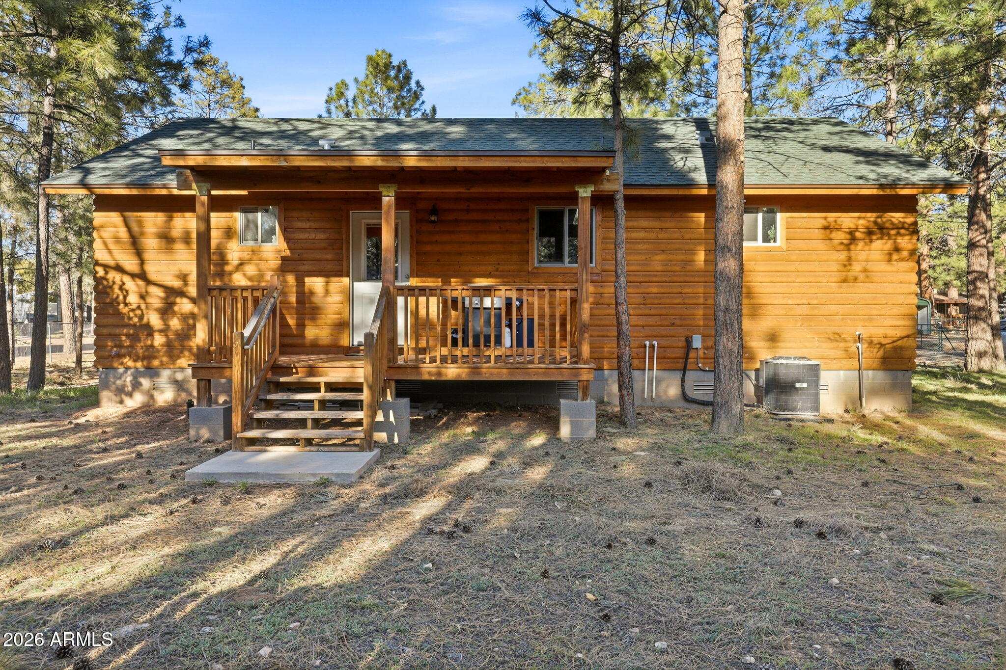 2900 Long Rifle Place Overgaard, AZ 85933 - Photo 25 of 35 a view of a house with a yard