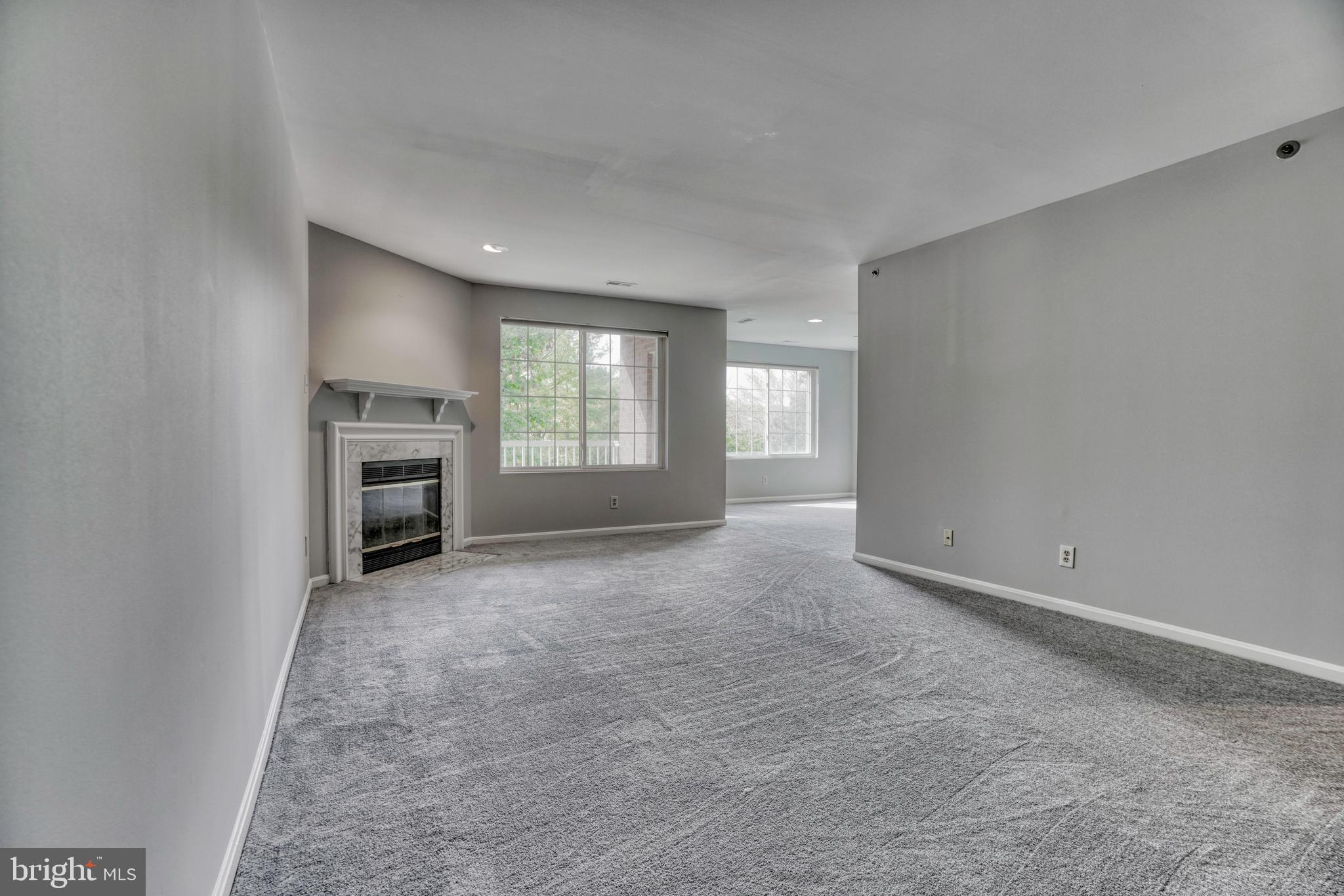 408 Kilree Road, Unit 202 Lutherville-Timonium, MD 21093 - Photo 16 of 33 Living room. Brand new flooring.