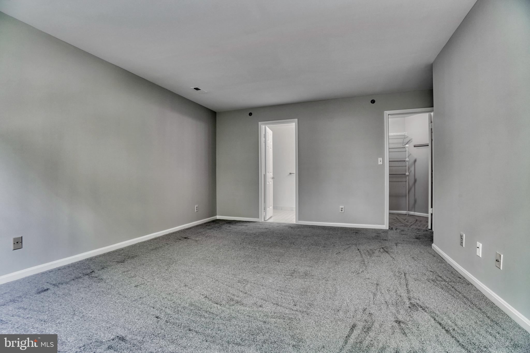 408 Kilree Road, Unit 202 Lutherville-Timonium, MD 21093 - Photo 19 of 33 Primary bedroom with bath.