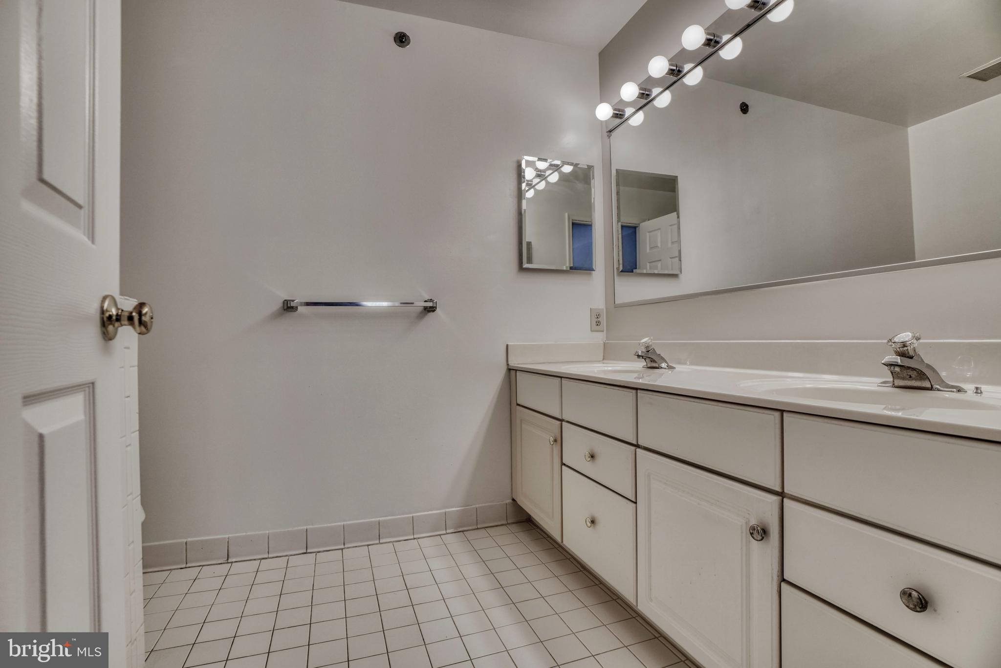 408 Kilree Road, Unit 202 Lutherville-Timonium, MD 21093 - Photo 21 of 33 Primary bath with two sinks.