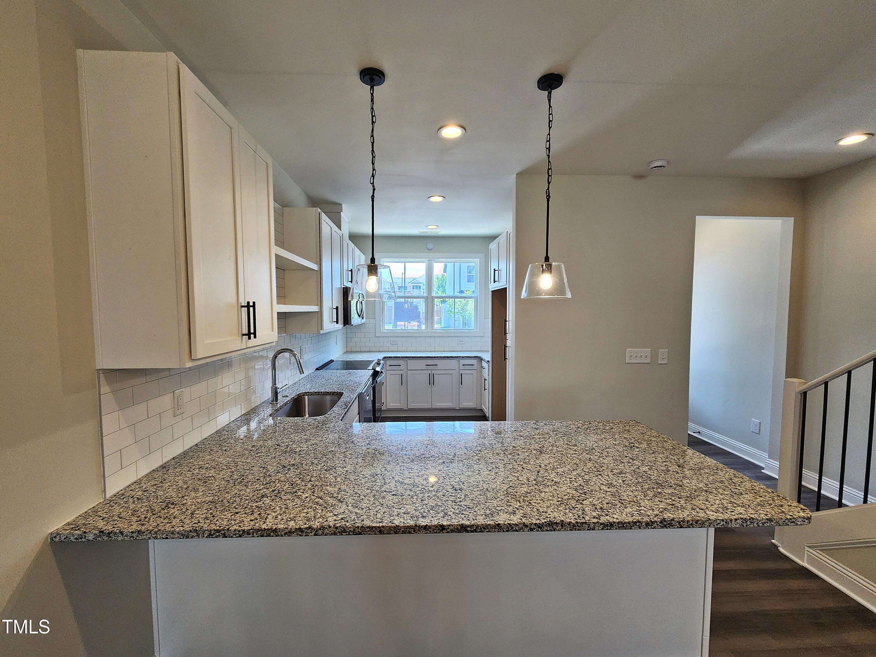 8611 Brushfoot Way, Unit 107 Raleigh, NC 27616 - Photo 6 of 27 kitchen b