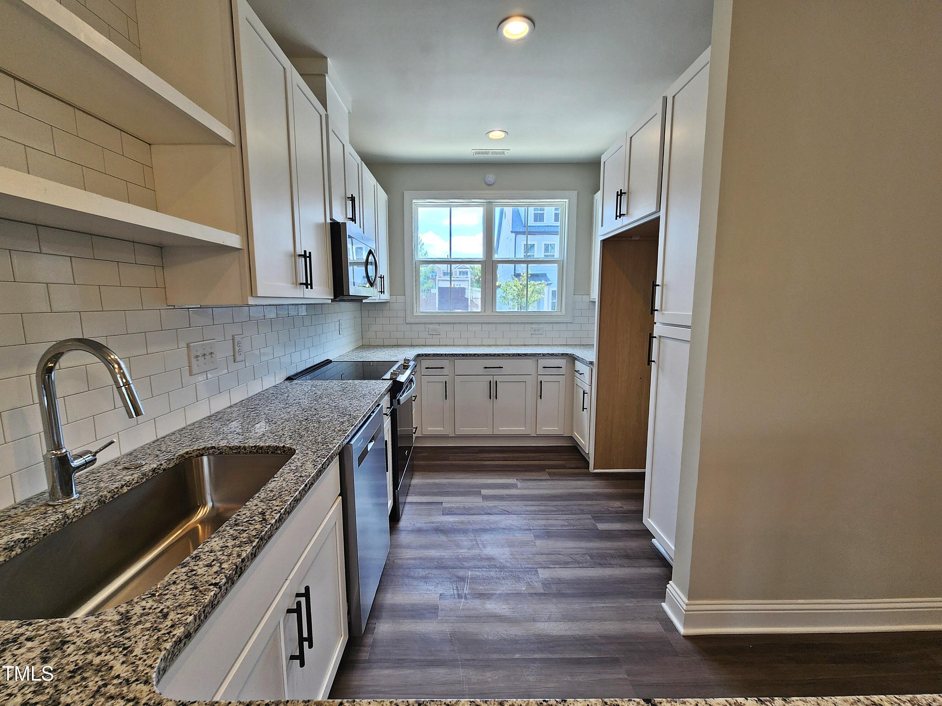 8611 Brushfoot Way, Unit 107 Raleigh, NC 27616 - Photo 8 of 27 kitchen d