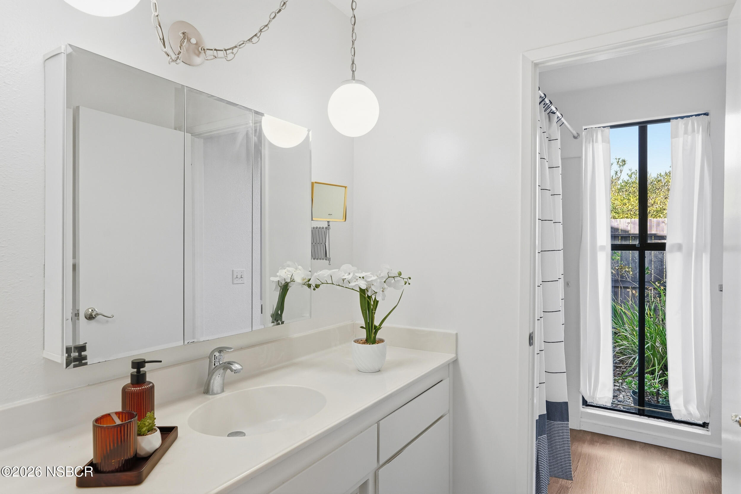 649 Burning Tree Way Lompoc, CA 93436 - Photo 30 of 72 a bathroom with a sink and a mirror