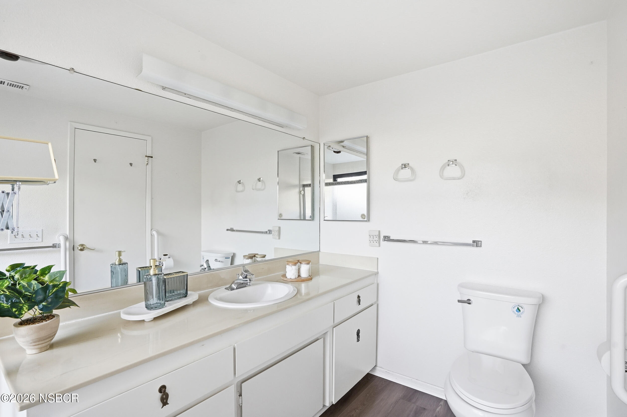 649 Burning Tree Way Lompoc, CA 93436 - Photo 36 of 72 a bathroom with a granite countertop sink mirror and toilet