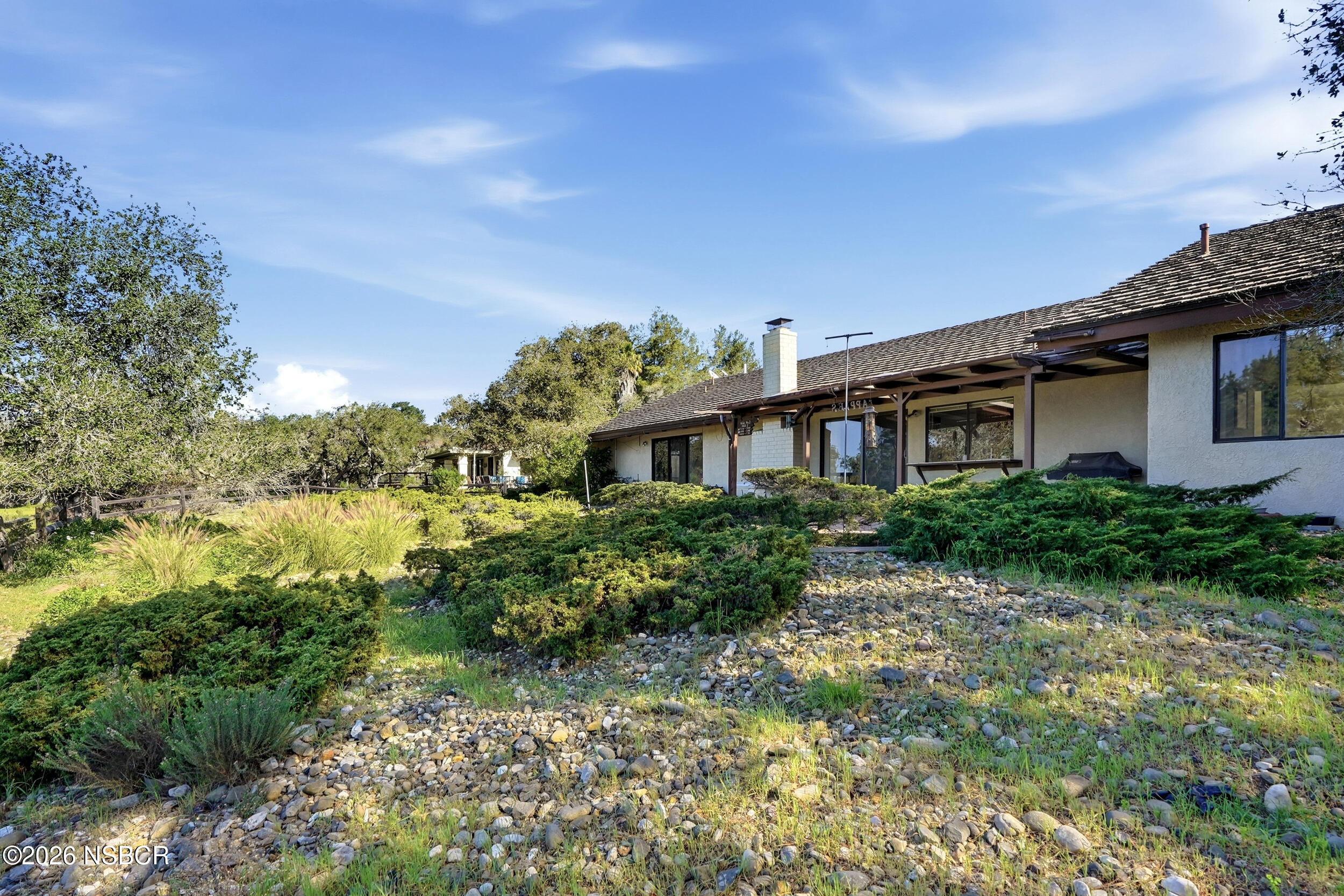 649 Burning Tree Way Lompoc, CA 93436 - Photo 45 of 72 a front view of a house with a garden