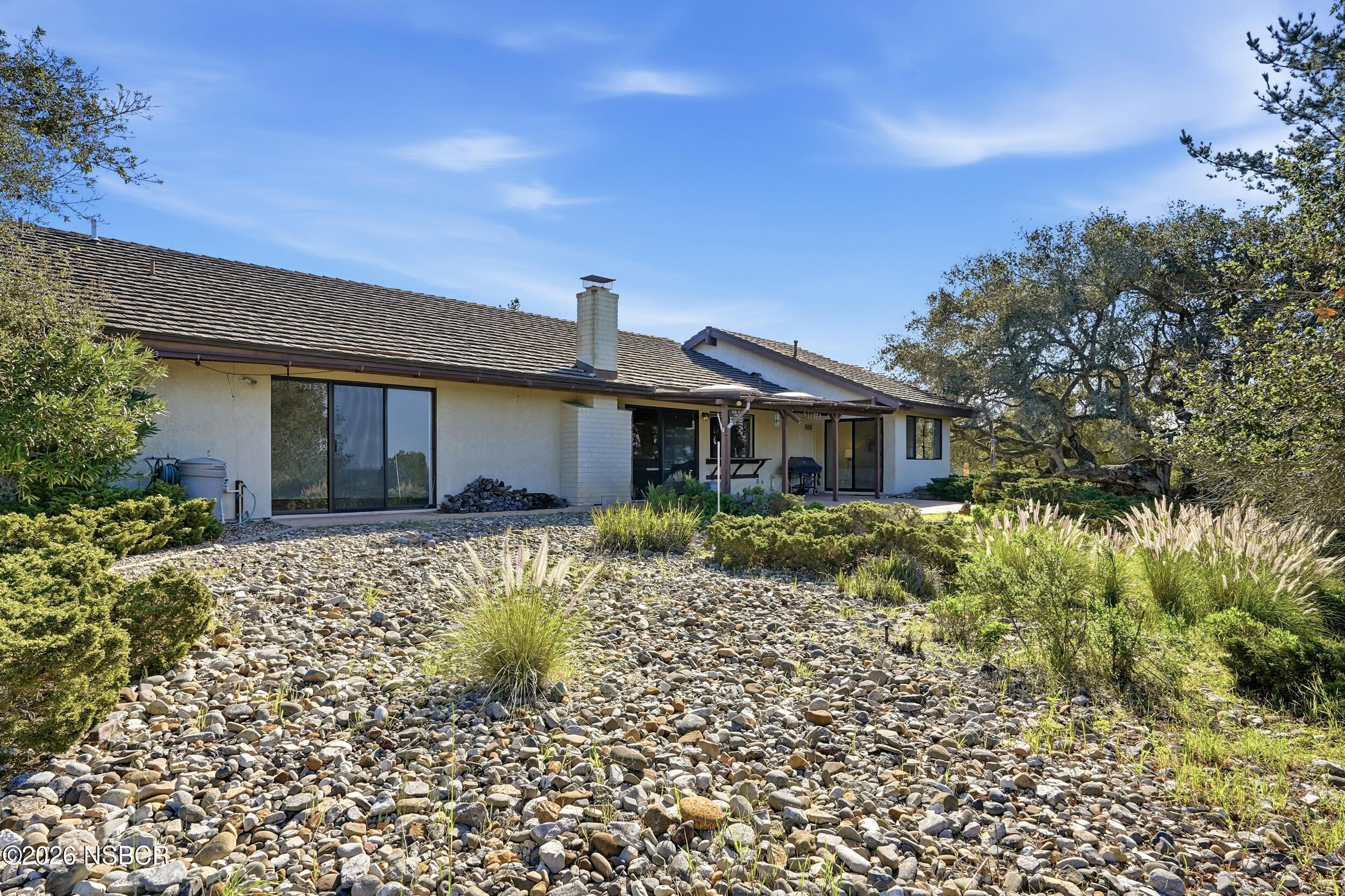 649 Burning Tree Way Lompoc, CA 93436 - Photo 46 of 72 a front view of a house with a garden