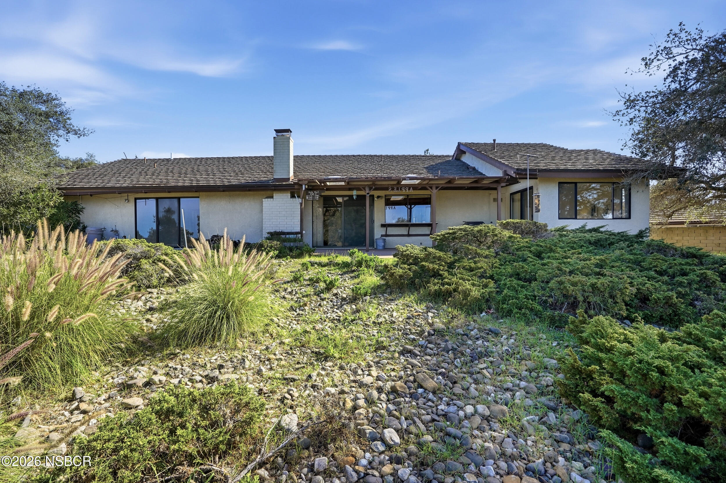 649 Burning Tree Way Lompoc, CA 93436 - Photo 49 of 72 a front view of a house with a yard