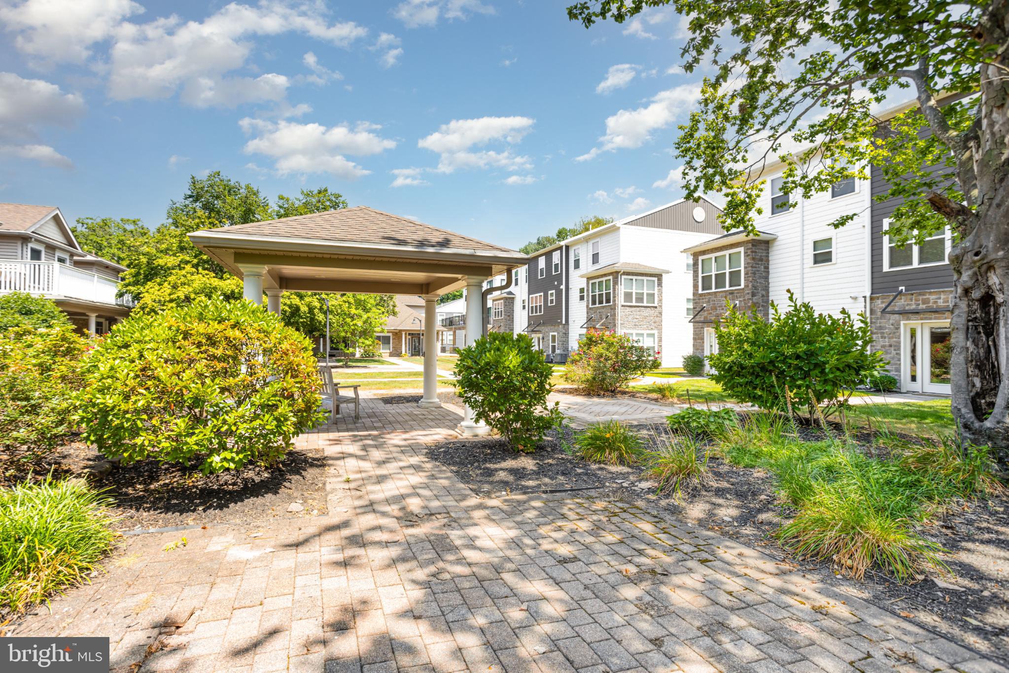 163 High Pointe Drive Hummelstown, PA 17036 - Photo 26 of 39 Charming pathway through lush greenery.