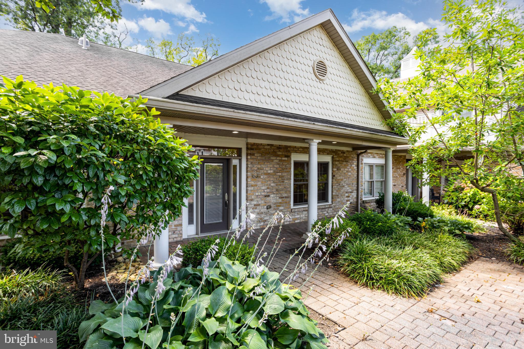 163 High Pointe Drive Hummelstown, PA 17036 - Photo 3 of 39 Charming entrance with lush greenery.