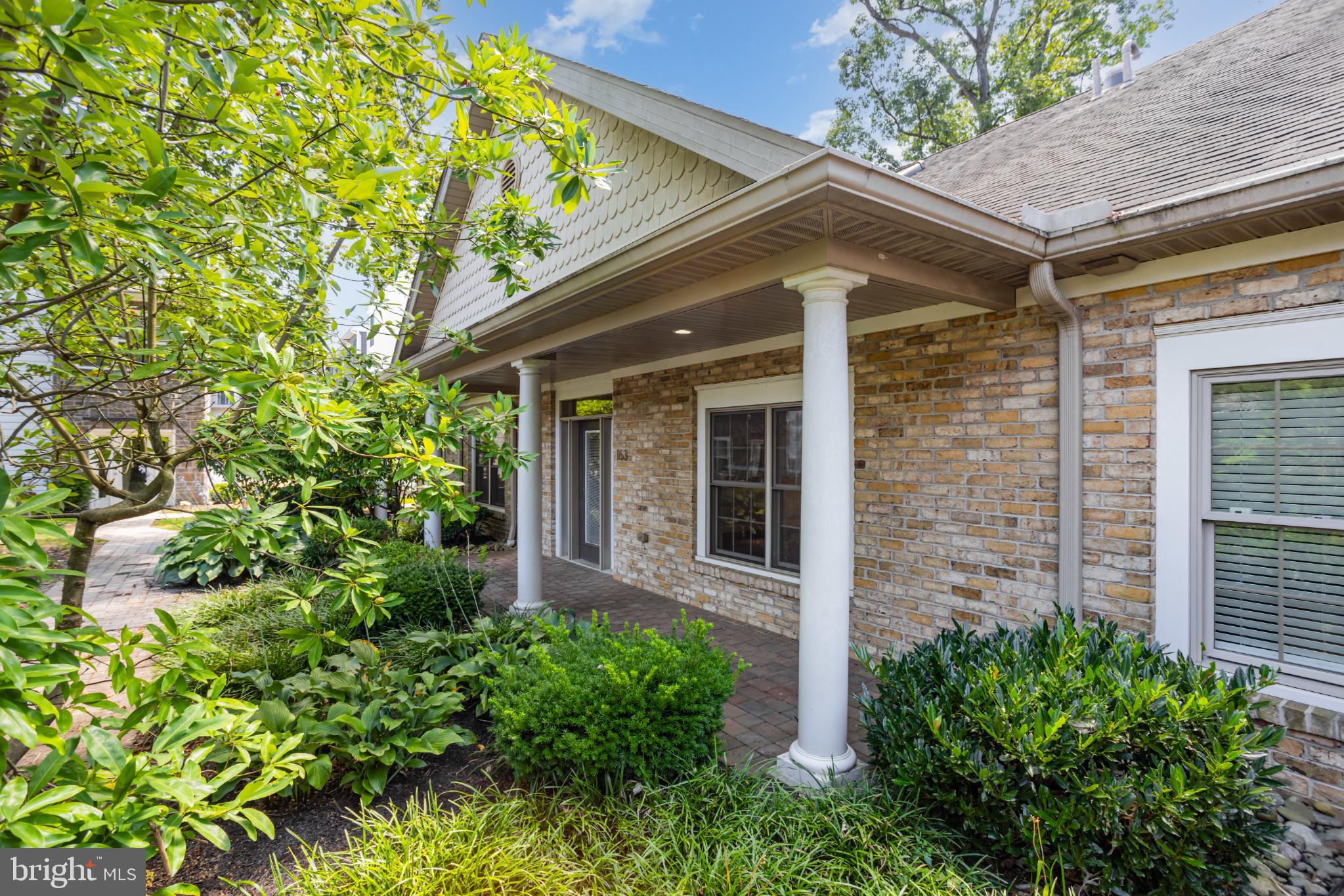 163 High Pointe Drive Hummelstown, PA 17036 - Photo 4 of 39 Charming entrance framed by lush greenery.