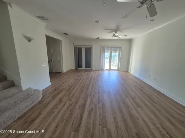 a bathroom with a sink toilet and window