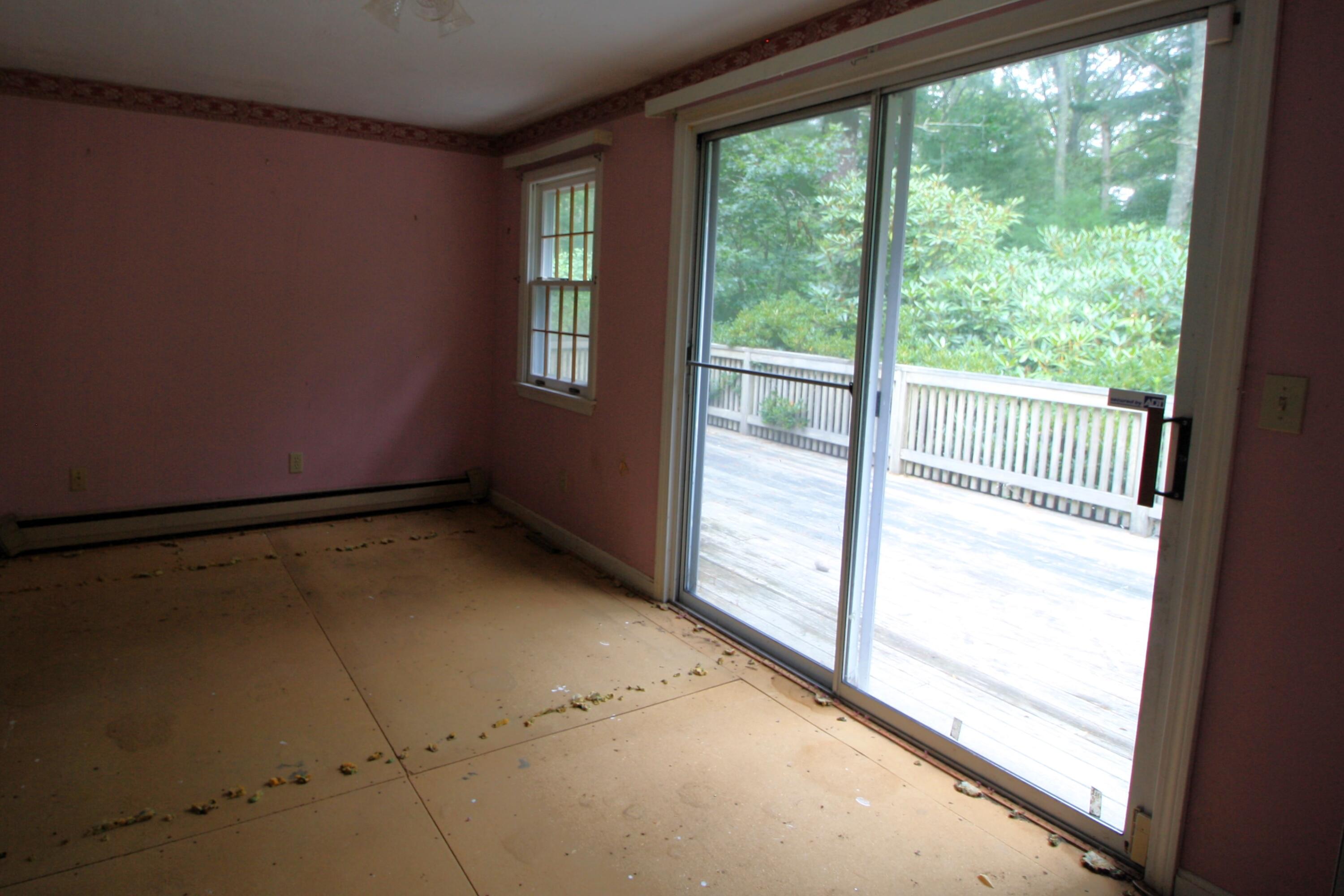177 Thistle Drive Centerville, MA 02632 - Photo 14 of 22 a view of a room with a large window