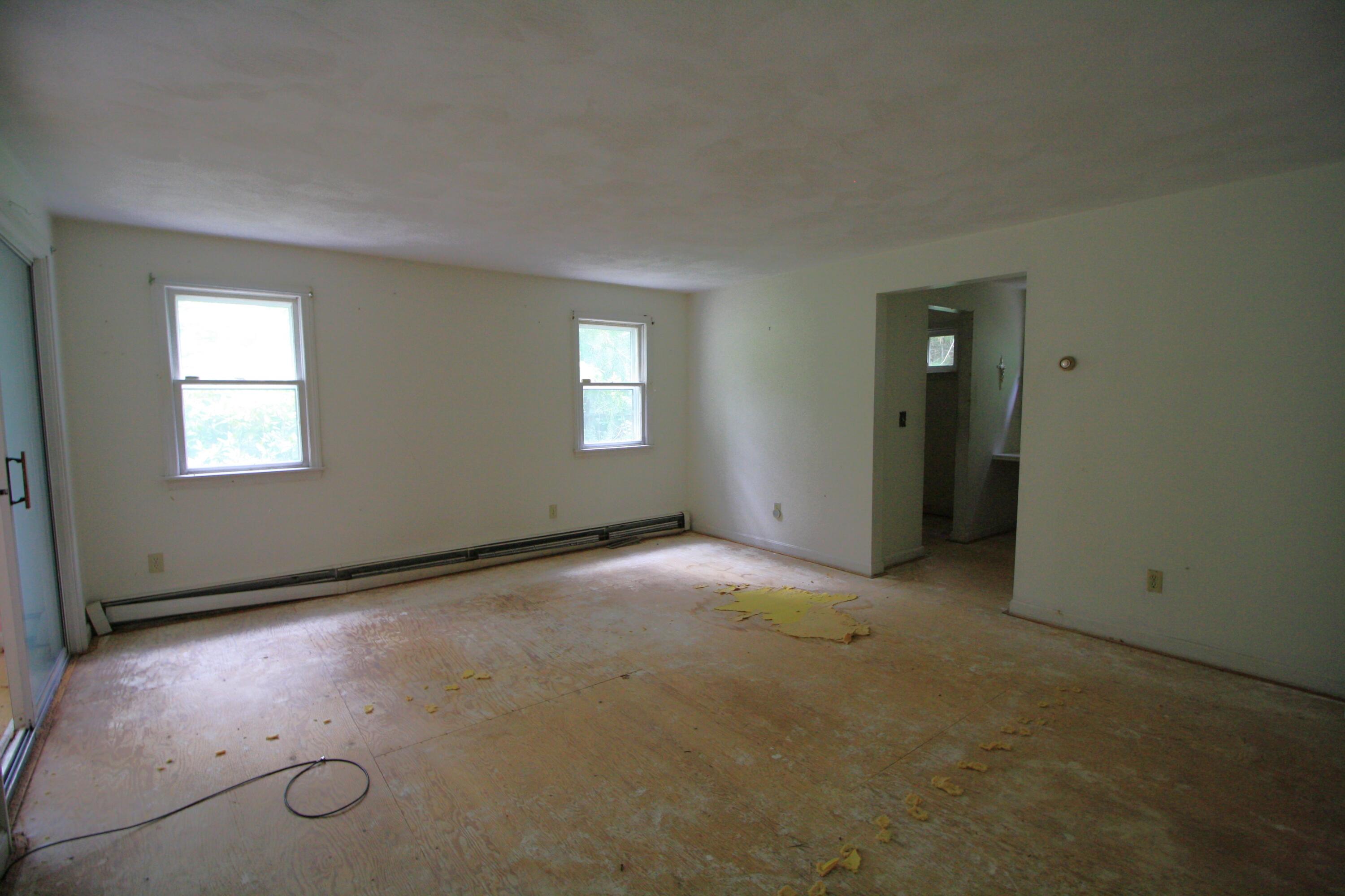 177 Thistle Drive Centerville, MA 02632 - Photo 17 of 22 an empty room with windows