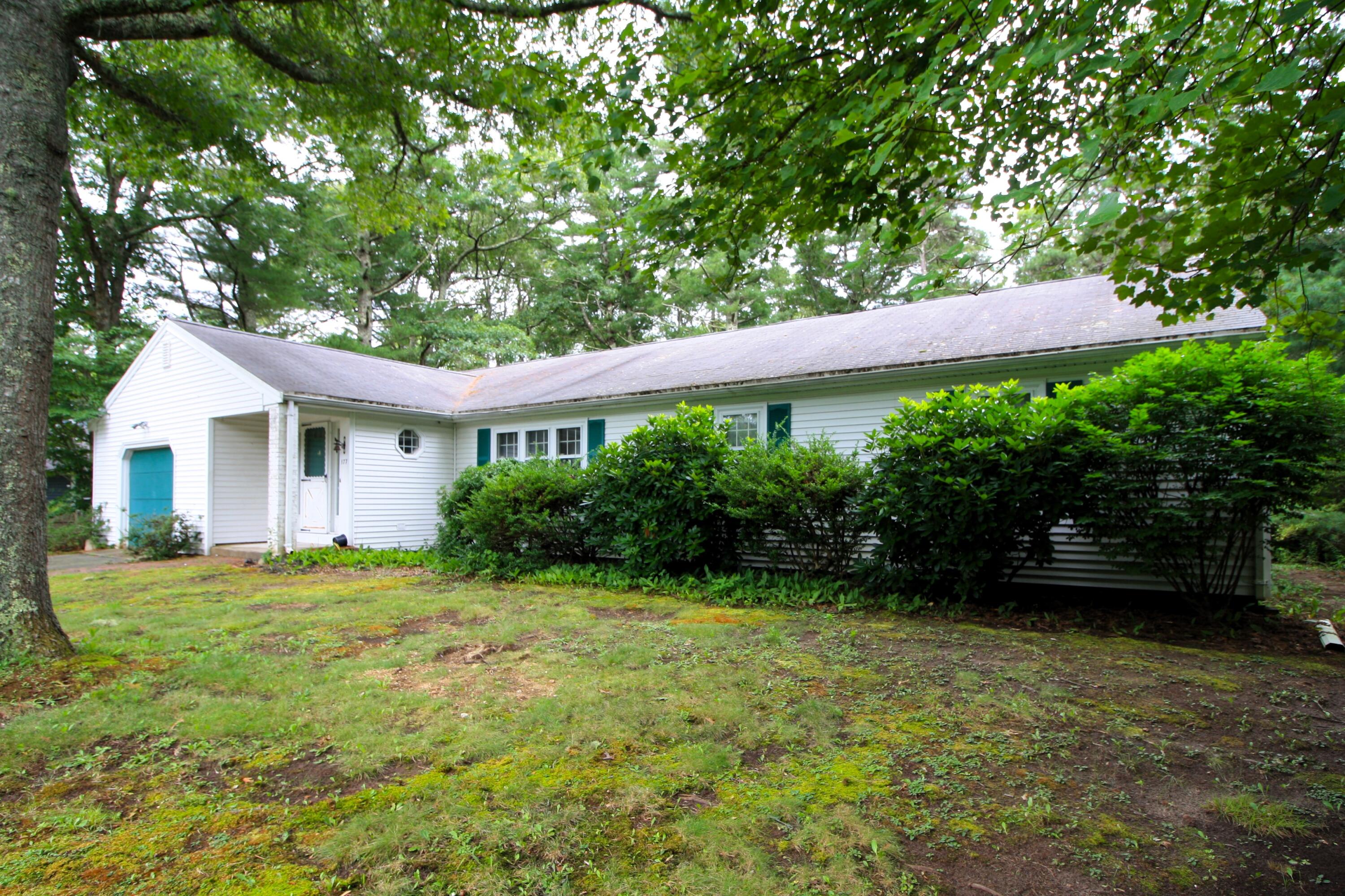 177 Thistle Drive Centerville, MA 02632 - Photo 2 of 22 a view of a house with a garden