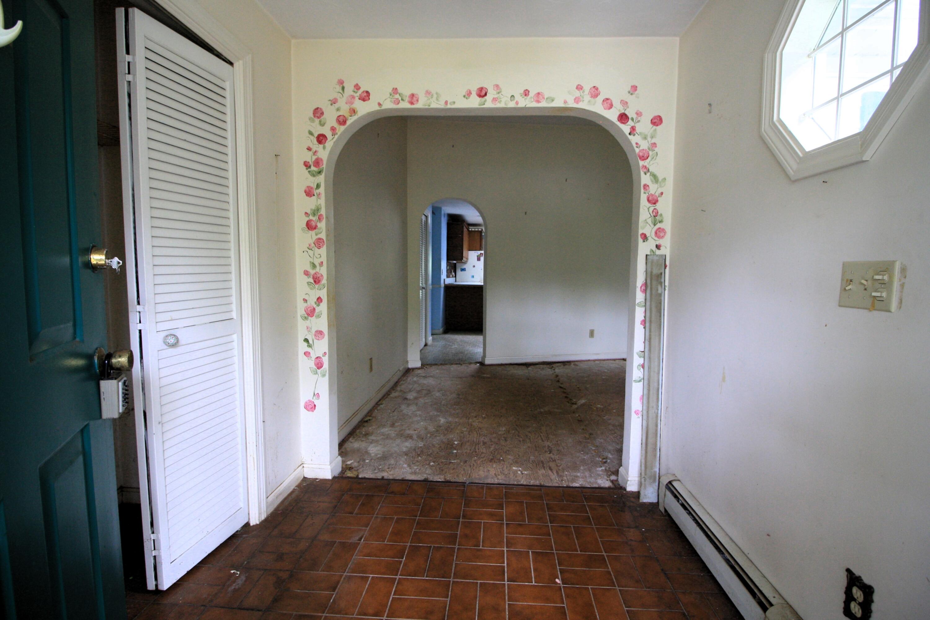 177 Thistle Drive Centerville, MA 02632 - Photo 6 of 22 a view of a hallway with wooden doors