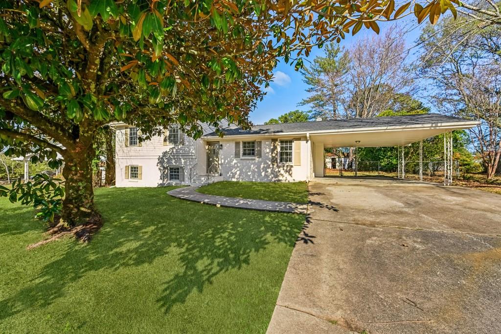 front view of a house with a yard