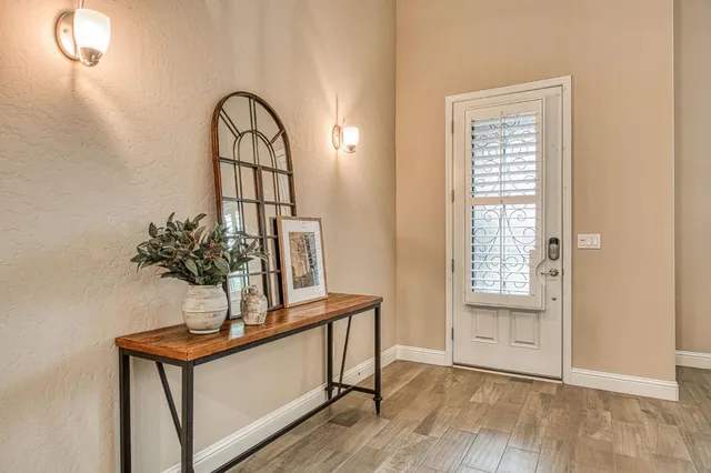 a view of entryway with wooden floor