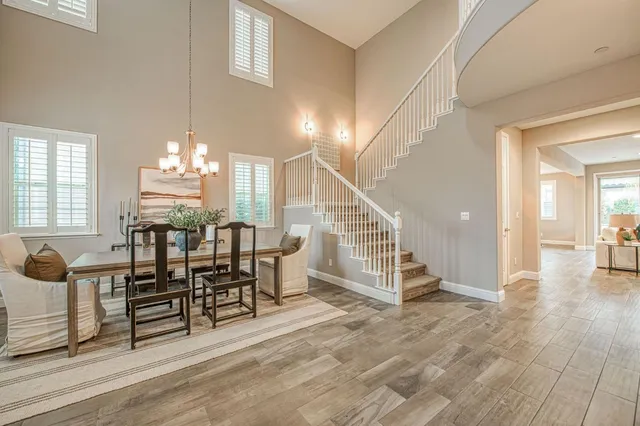 a view of a livingroom with furniture and wooden floor