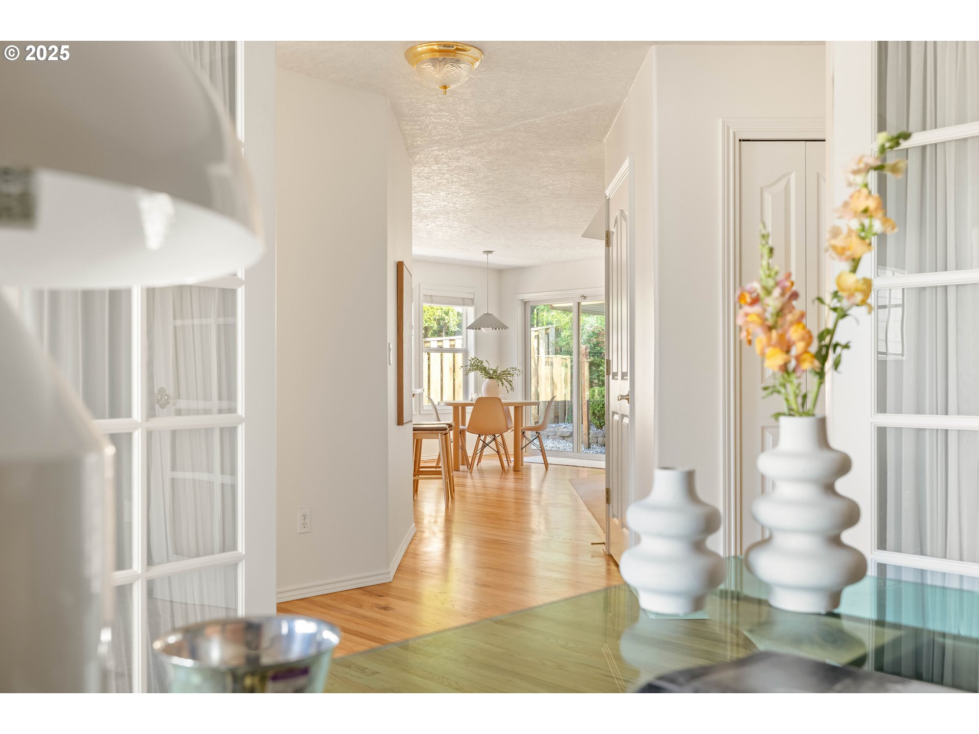 1356 Southeast Larch Way Gresham, OR 97080 - Photo 21 of 41 a view of living room filled with furniture and wooden floor