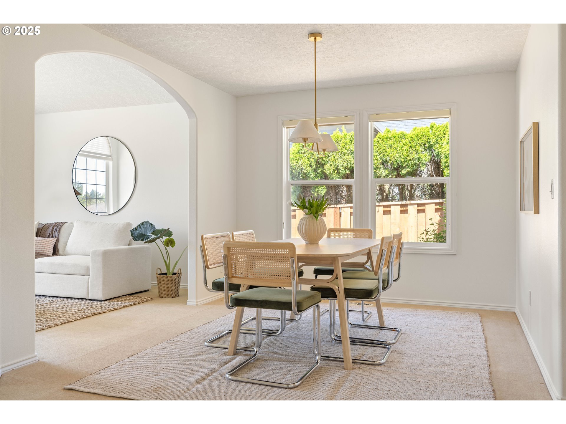 1356 Southeast Larch Way Gresham, OR 97080 - Photo 7 of 41 a dining room with wooden floor a glass table and chairs