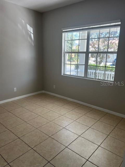 20010 Daytona Way Tampa, FL 33647 - Photo 17 of 19 an empty room with windows