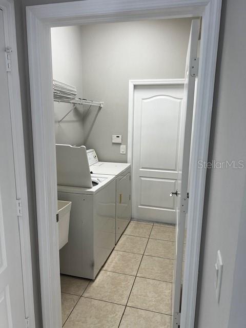 20010 Daytona Way Tampa, FL 33647 - Photo 19 of 19 a room with a washer and dryer